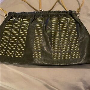 Miu Miu Black with contrast stitching on front.